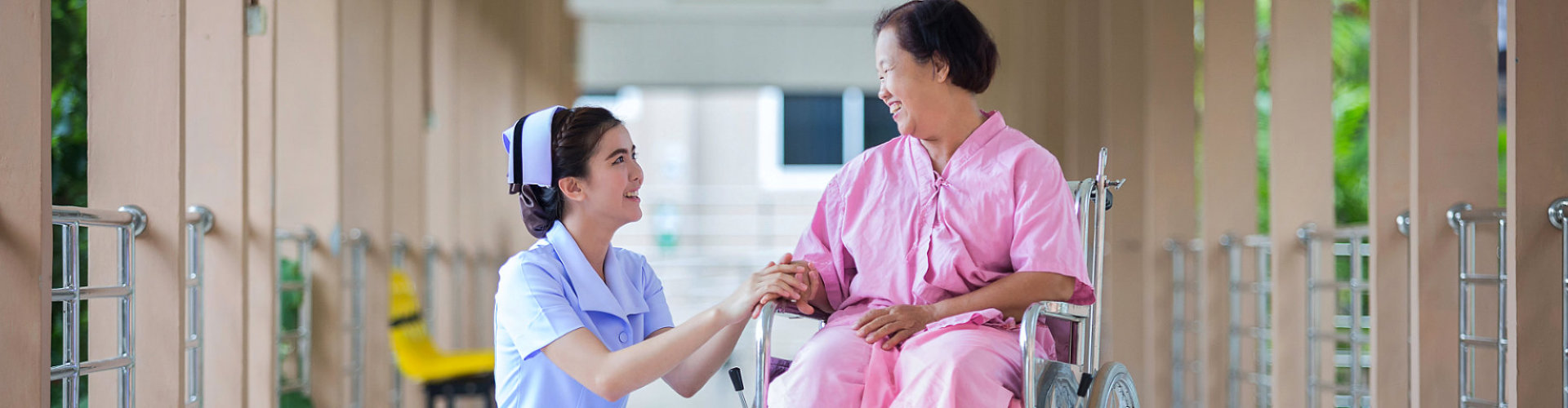 female nurse talking to a senior woman